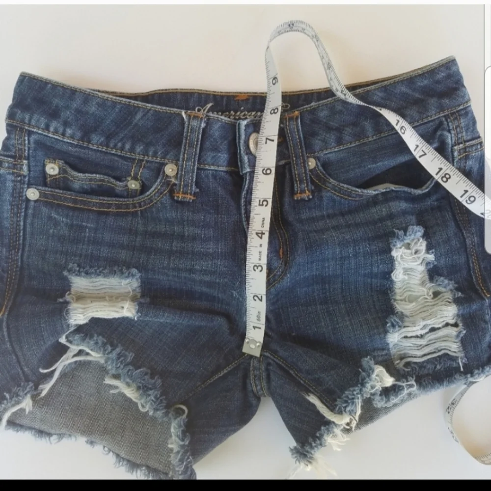 American Eagle custom distressed cutoffs size 00